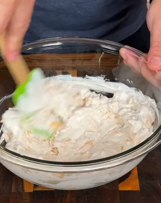 The cream cheese, dip and cheddar mixed into a thick creamy filling