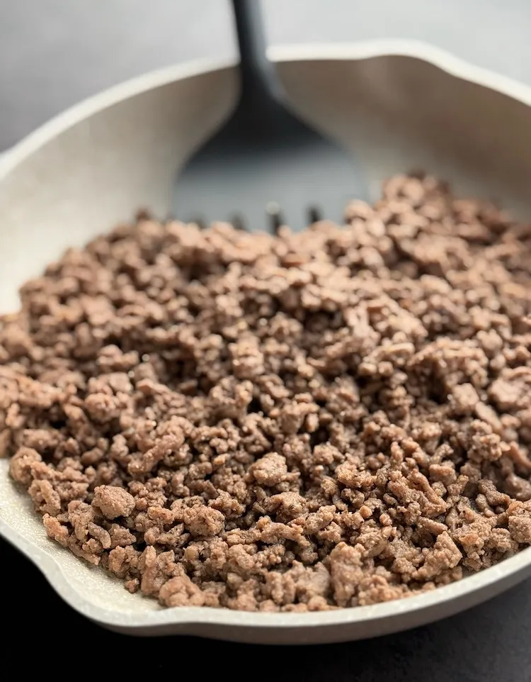 Ground beef browned in a skillet